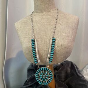 Signed Tommy Lowe Navajo. Turquoise stones.